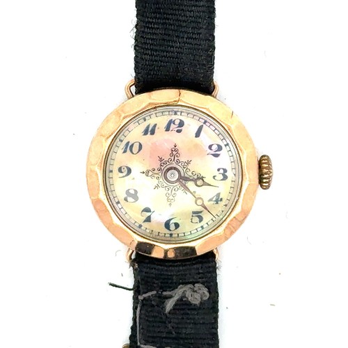 617 - 9ct gold ladies wristwatch with mother of pearl dial