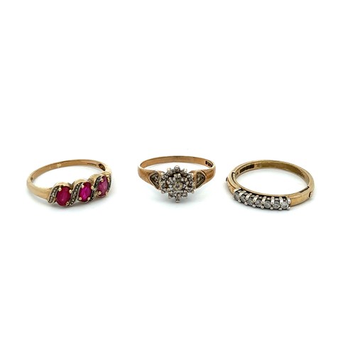 472 - Three 9ct gold rings. Ruby with diamond accents, size T, 7 stone diamond ring size R, diamond cluste... 