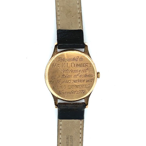 618 - A gents Zenith wristwatch wth leather strap. Inscribed on back. Watch is ticking.