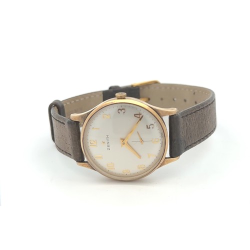 618 - A gents Zenith wristwatch wth leather strap. Inscribed on back. Watch is ticking.