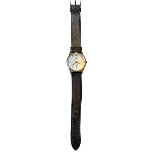 618 - A gents Zenith wristwatch wth leather strap. Inscribed on back. Watch is ticking.