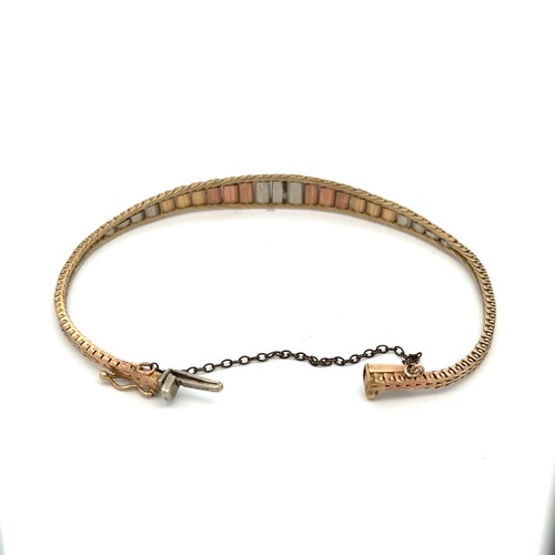 428 - A tri colour gold bracelet, stamped 9k and 375. Approx 8.2g.