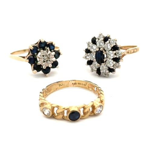 432 - Three sapphire rings, all hallmarked 9ct. Flower ring with small diamond at centre size M, 3 stone s... 