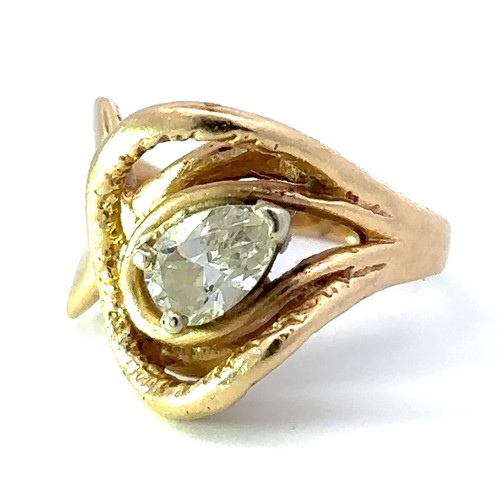 426 - Pear cut diamond ring in unmarked gold (tests as 15ct). Diamond approx 0.45ct. Weight 5g approx. Siz... 