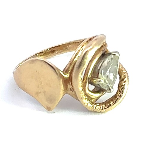 426 - Pear cut diamond ring in unmarked gold (tests as 15ct). Diamond approx 0.45ct. Weight 5g approx. Siz... 