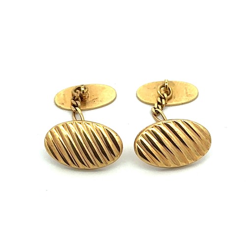 498 - A pair of hallmarked 9ct gold cufflinks.