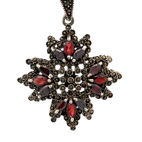 402 - Some marcasite and garnet jewellery including a white metal purse pendant with chain (small chip to ... 