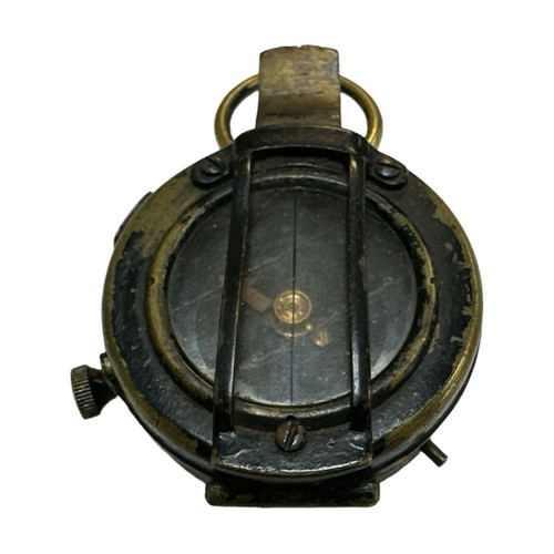 185 - A First World War (WWI) British brass marching compass 1918, painted black exterior. Reverse reads F... 