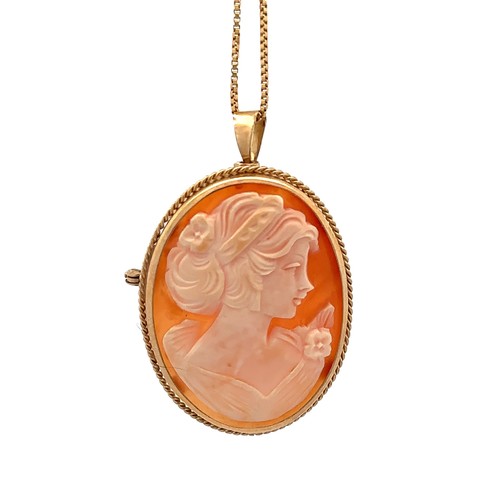 420 - A 9ct gold shell cameo depicting a lady in profile with flower in her hair, approx 38mm in length. C... 