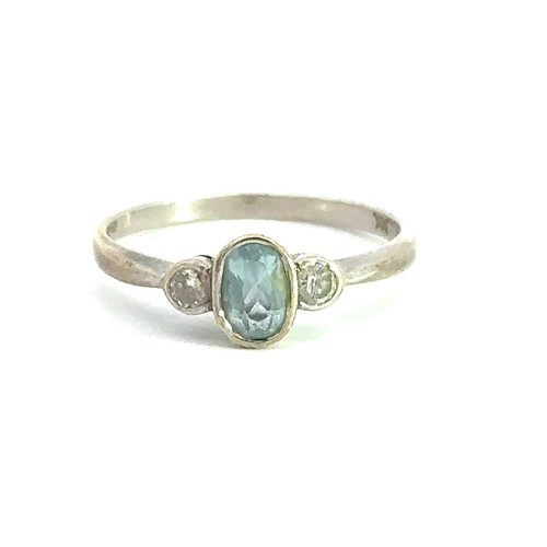 408 - An aquamarine and diamond ring, set in 9ct white gold. Size P.