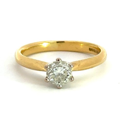 490 - A solitaire diamond 18ct gold ring. Diamond is lively and in good condition, approx 0.52ct and  SI2 ... 