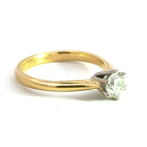 490 - A solitaire diamond 18ct gold ring. Diamond is lively and in good condition, approx 0.52ct and  SI2 ... 