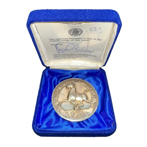 373 - A 1973-74 Royal Academy Chinese Exhibition silver medallion, horse on one side, the other reads ‘At ... 