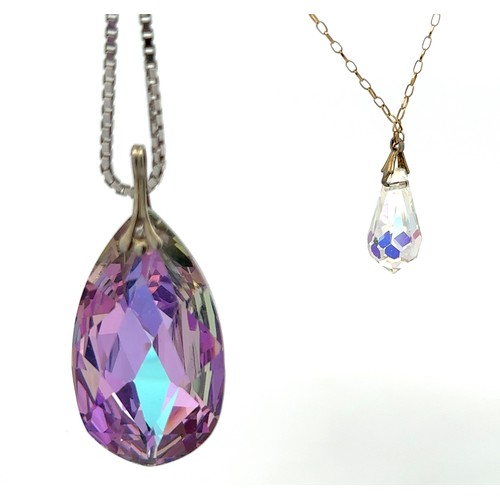 470 - 2 crystal pendants with chains. Larger pendant is 45mm length approx and suspended from a box chain ... 