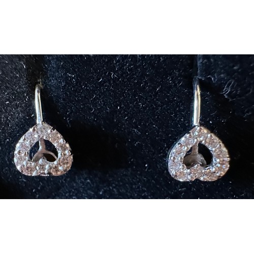 457 - Diamond heart screwback earrings set in white metal stamped 18 carat gold on reverse.