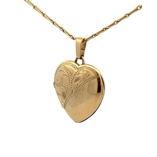 487 - A hallmarked 9ct gold heart locket on a hallmarked 9ct gold chain. Total weight 5.8g approx.