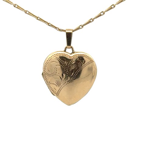 487 - A hallmarked 9ct gold heart locket on a hallmarked 9ct gold chain. Total weight 5.8g approx.