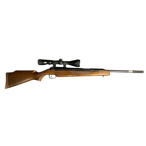 121 - Diana Mod 52 .22 side lever air rifle, serial number 973050, beech wood stock having chequered embos... 