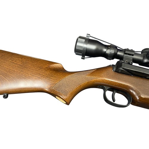 121 - Diana Mod 52 .22 side lever air rifle, serial number 973050, beech wood stock having chequered embos... 