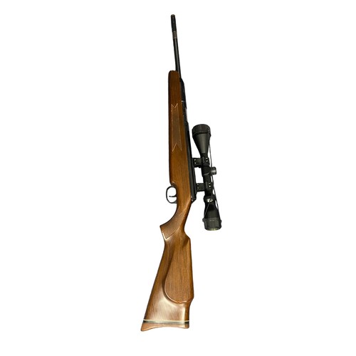 121 - Diana Mod 52 .22 side lever air rifle, serial number 973050, beech wood stock having chequered embos... 