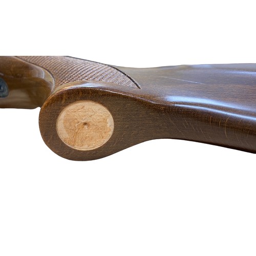 121 - Diana Mod 52 .22 side lever air rifle, serial number 973050, beech wood stock having chequered embos... 