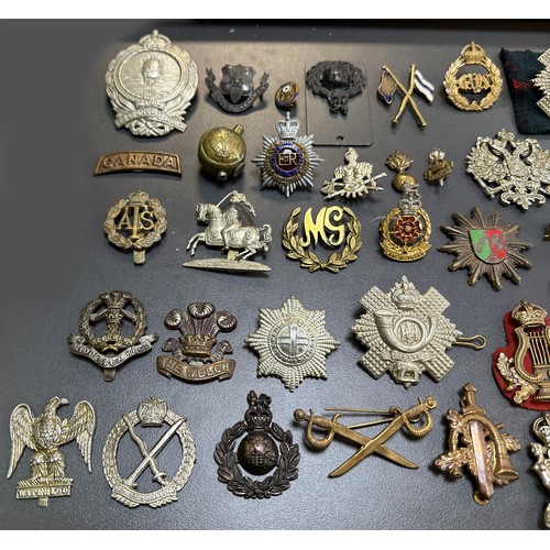 164 - Assortment of Cap Badges, some better, to include; Assaye (x2), Royal Army Service Corps, Lancastria... 