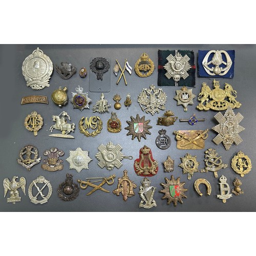 164 - Assortment of Cap Badges, some better, to include; Assaye (x2), Royal Army Service Corps, Lancastria... 