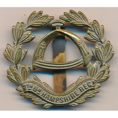 168 - A 7th Bn Hampshire Regt cap badge, inscribed J.R. GAUNT LONDON to pin.