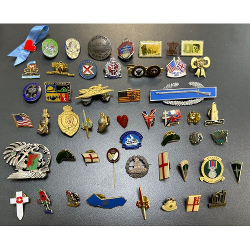 169 - A large selection of various enamel pin badges, some interesting examples, largely military related,... 