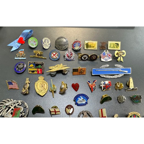 169 - A large selection of various enamel pin badges, some interesting examples, largely military related,... 