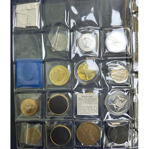 381 - Collection of commemorative medals, coins and tokens in an album, in very mixed condition, mainly 20... 