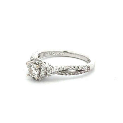 417 - A Vera Wang 'Love' diamond ring, size   . Total diamond weight approx 0.7ct.  Ring is 18ct white gol... 