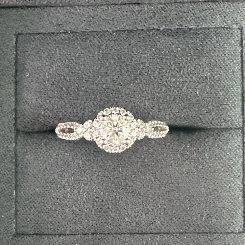 417 - A Vera Wang 'Love' diamond ring, size   . Total diamond weight approx 0.7ct.  Ring is 18ct white gol... 