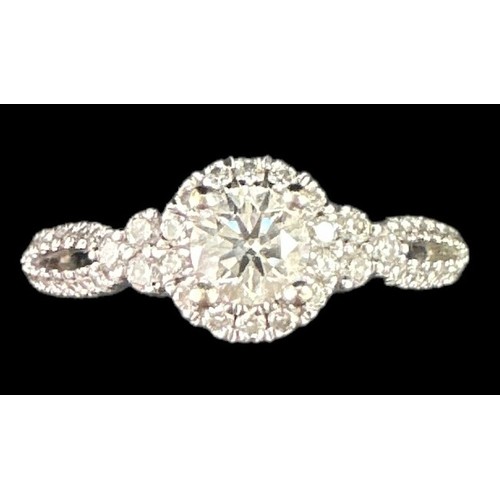 417 - A Vera Wang 'Love' diamond ring, size   . Total diamond weight approx 0.7ct.  Ring is 18ct white gol... 