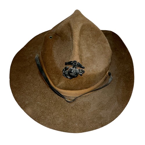 202 - A USMC United States Marine Corps drill campaign hat. Heavy felt construction with typical x4 dent s... 