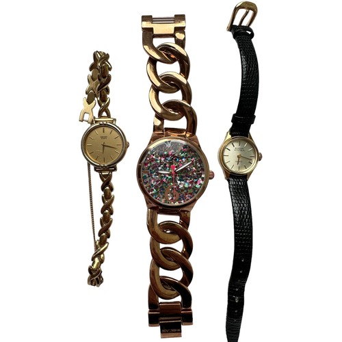 636 - Three Watches, a  Bulova Accutron quartz watch with baton hour markers and black leather strap, a la... 