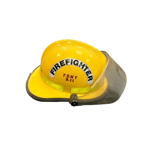 41 - A selection of three Fire Fighting helmets to include; a Cairns & Brother FireFighter Yellow O.W.L V... 