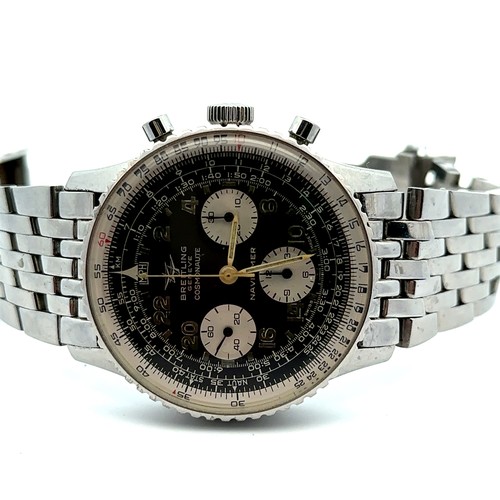 575 - A 1969 Breitling Chronograph Cosmonaute Navitimer Watch, model no. 809. Stainless steel brick link b... 