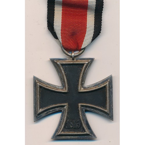 27 - Germany – A Second World War German Iron Cross (2nd Class), dated 1939, with ribbon.