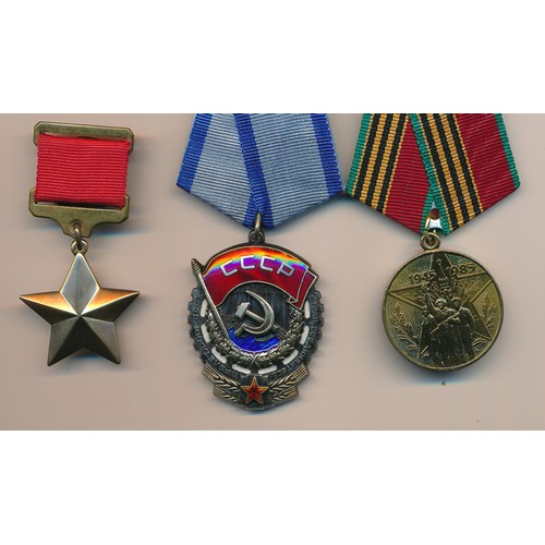 34 - USSR – Selection of USSR medals to include; a Soviet Red Banner Labor Order Medal USSR CCCP awarded ... 