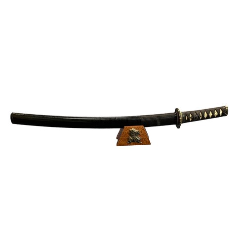 68 - Japanese Wakizashi short sword, single edged curved blade, unsigned to main blade, ray skin wrapped ... 