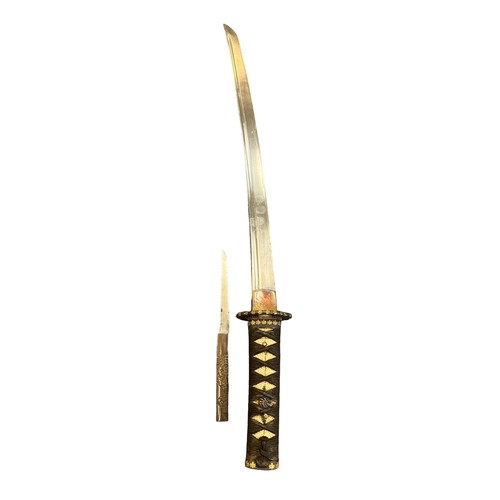 68 - Japanese Wakizashi short sword, single edged curved blade, unsigned to main blade, ray skin wrapped ... 