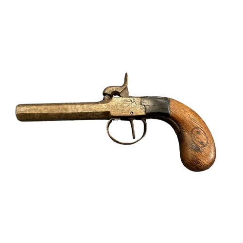 115 - French 19th century cap and ball pistol, wooden handle.