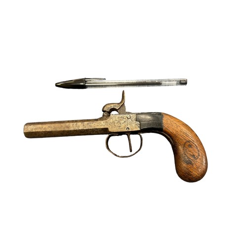 115 - French 19th century cap and ball pistol, wooden handle.