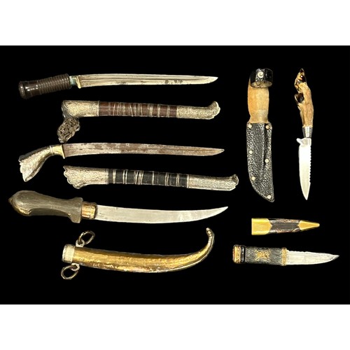 85 - Range of five daggers with scabbards