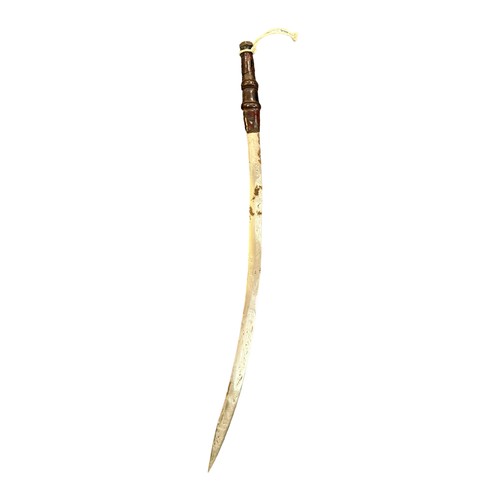 86 - Native blade with scabbard, blade length 43cm, total length with scabbard 57cm.