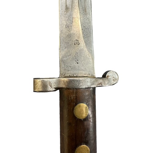 92 - Enfield late 19th century double edged bayonet, with metal mounted leather scabbard, blade stamped w... 