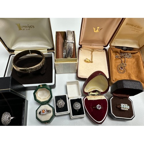 504 - A selection of jewellery including an amethyst pendant stamped 9ct, two 18ct gold plated gemset neck... 