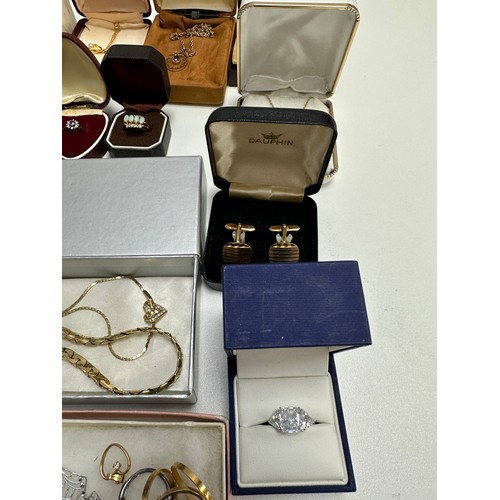 504 - A selection of jewellery including an amethyst pendant stamped 9ct, two 18ct gold plated gemset neck... 