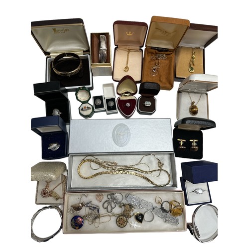 504 - A selection of jewellery including an amethyst pendant stamped 9ct, two 18ct gold plated gemset neck... 